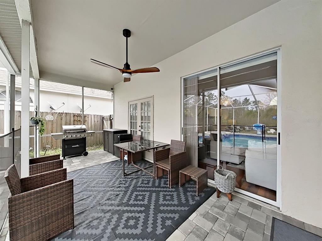9630 Fox Hearst Road Tampa, FL 33647 - Photo 39 of 47 a living room with lots of furniture and a large window