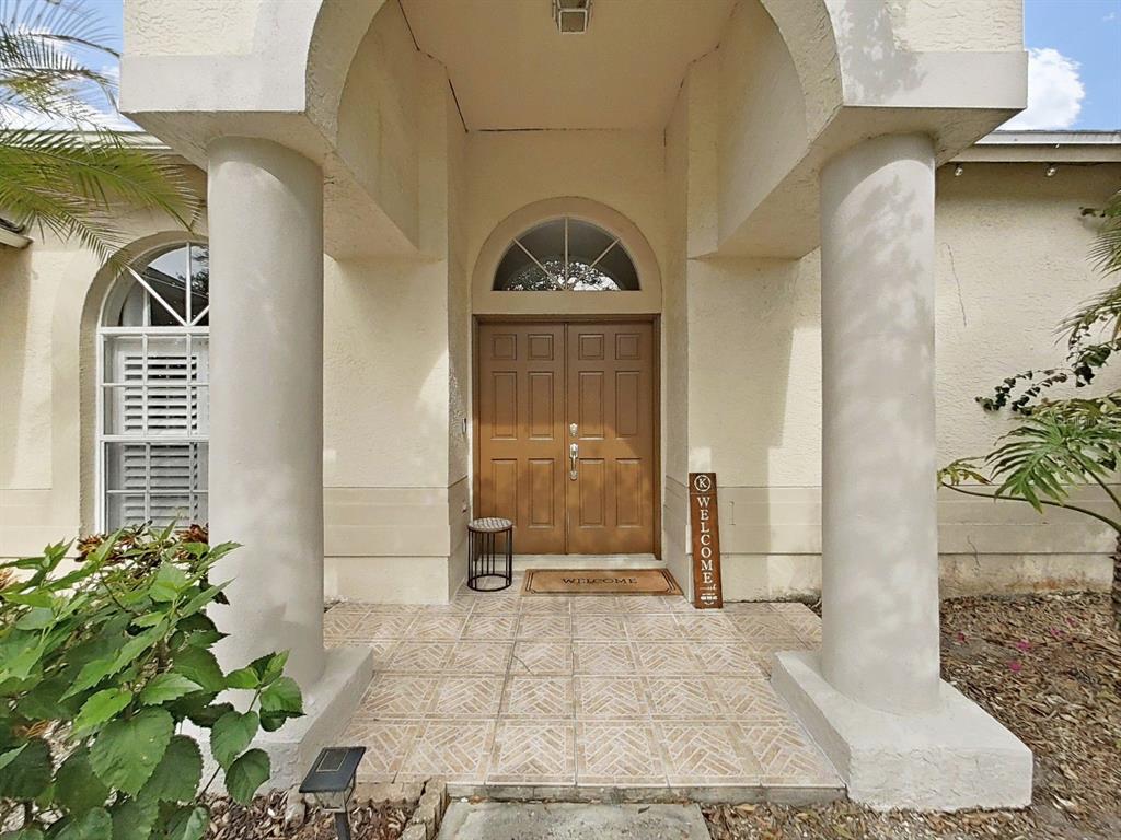 9630 Fox Hearst Road Tampa, FL 33647 - Photo 5 of 47 a view of a entryway door of the house