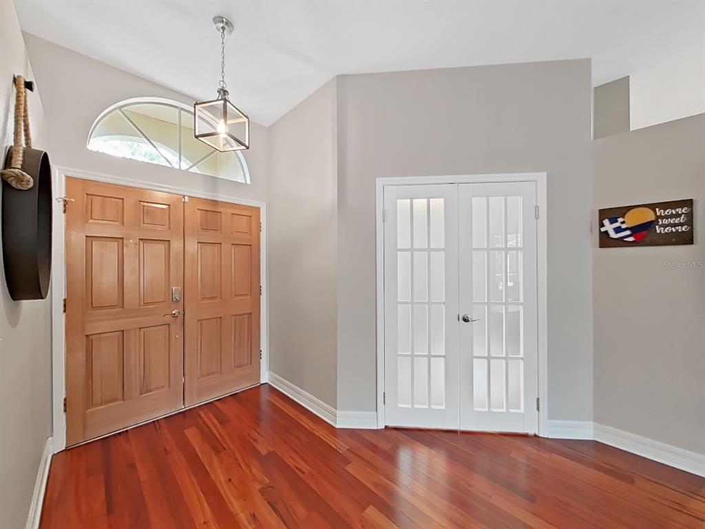 9630 Fox Hearst Road Tampa, FL 33647 - Photo 8 of 47 a view of empty room with wooden floor and fan