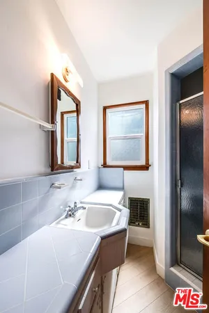 a bathroom with a sink and a bathtub