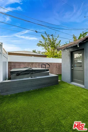 a view of a back yard of the house
