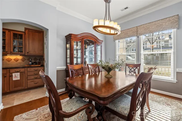 a room with storage and a table