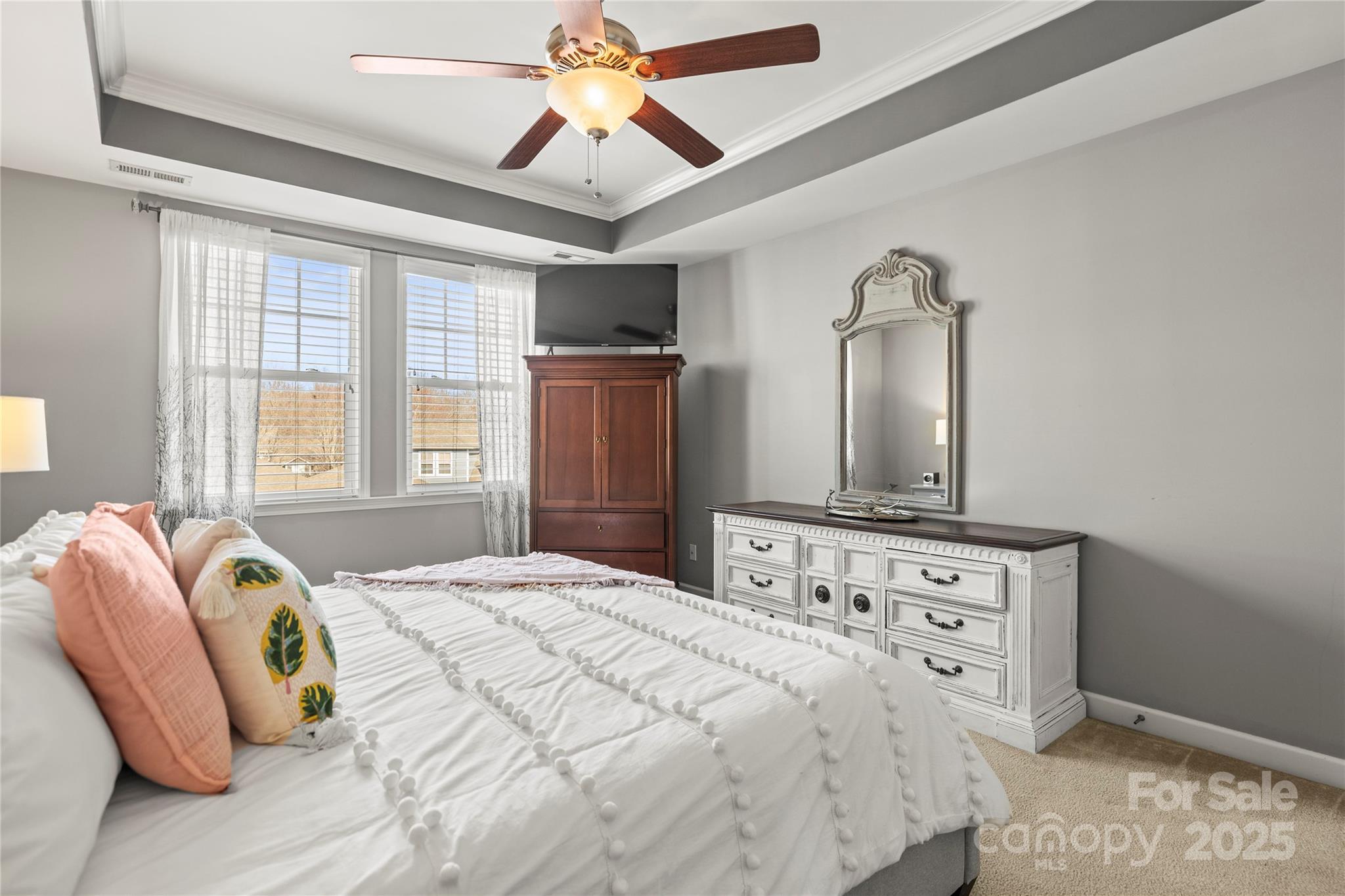 9415 Rosalyn Glen Road Cornelius, NC 28031 - Photo 7 of 46 a bedroom with bed and window