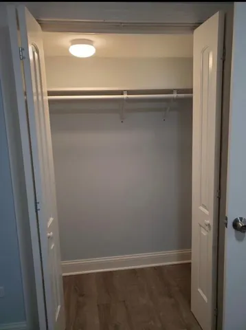 a kitchen with stainless steel appliances granite countertop a refrigerator sink and stove