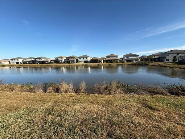 a view of a lake with a city view