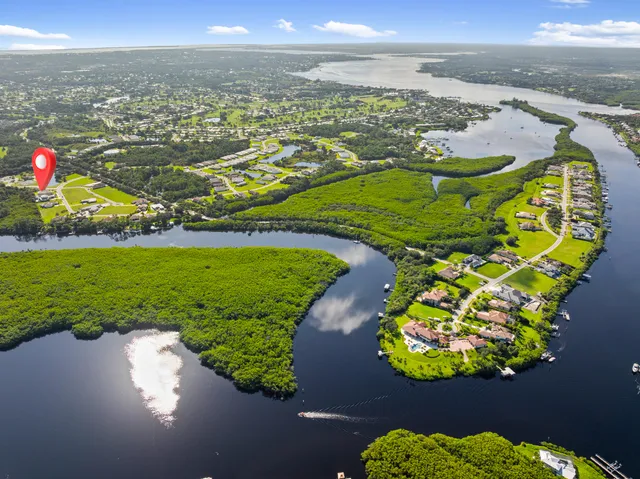 a large white kitchen with cabinets and a dishwasher