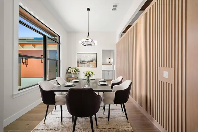 a kitchen with a refrigerator and a sink
