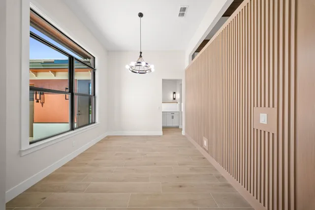 a view of a room with racks on the wall