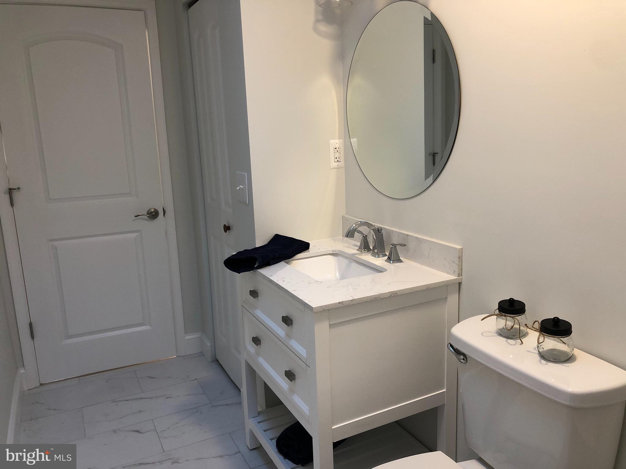138 Grimes Golden Road Linden, VA 22642 - Photo 33 of 77 a bathroom with a sink and a mirror
