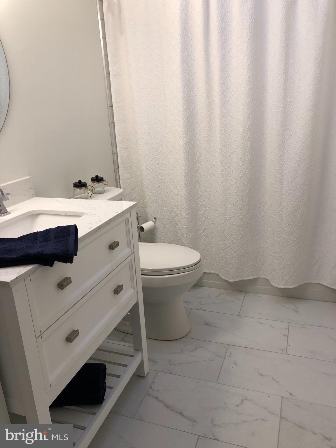 138 Grimes Golden Road Linden, VA 22642 - Photo 35 of 77 a bathroom with a sink toilet and vanity