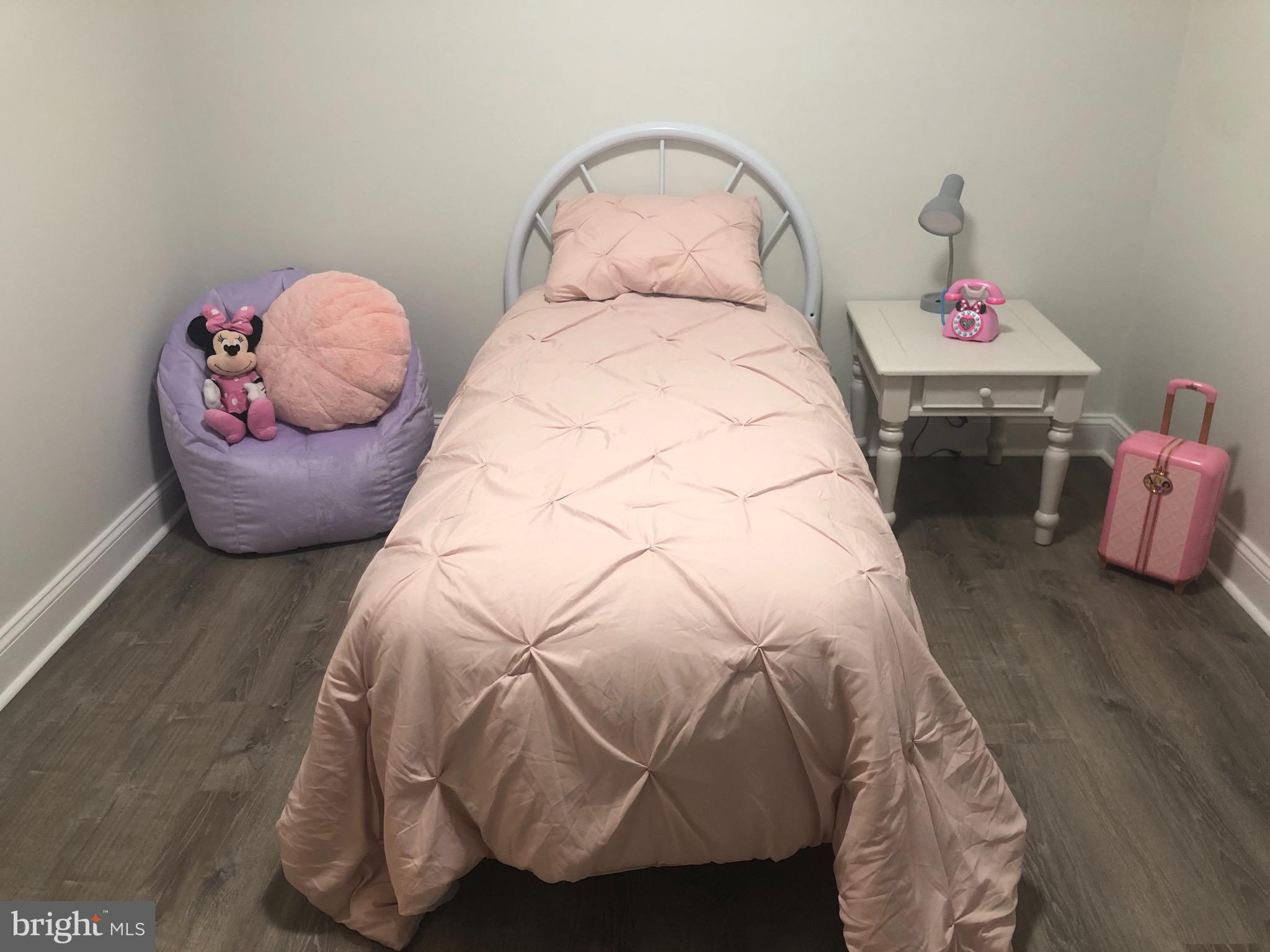 138 Grimes Golden Road Linden, VA 22642 - Photo 49 of 77 a bed room with a bed and a wooden floor