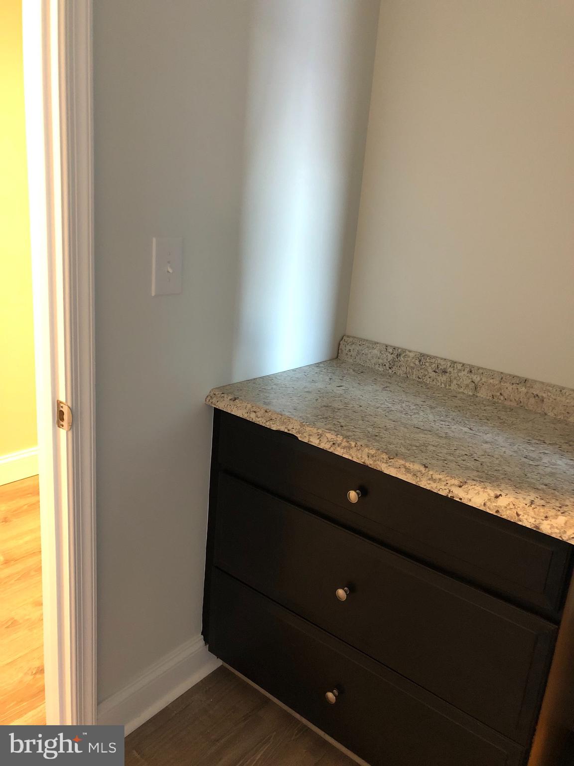 138 Grimes Golden Road Linden, VA 22642 - Photo 63 of 77 a bathroom with a granite countertop sink and a window