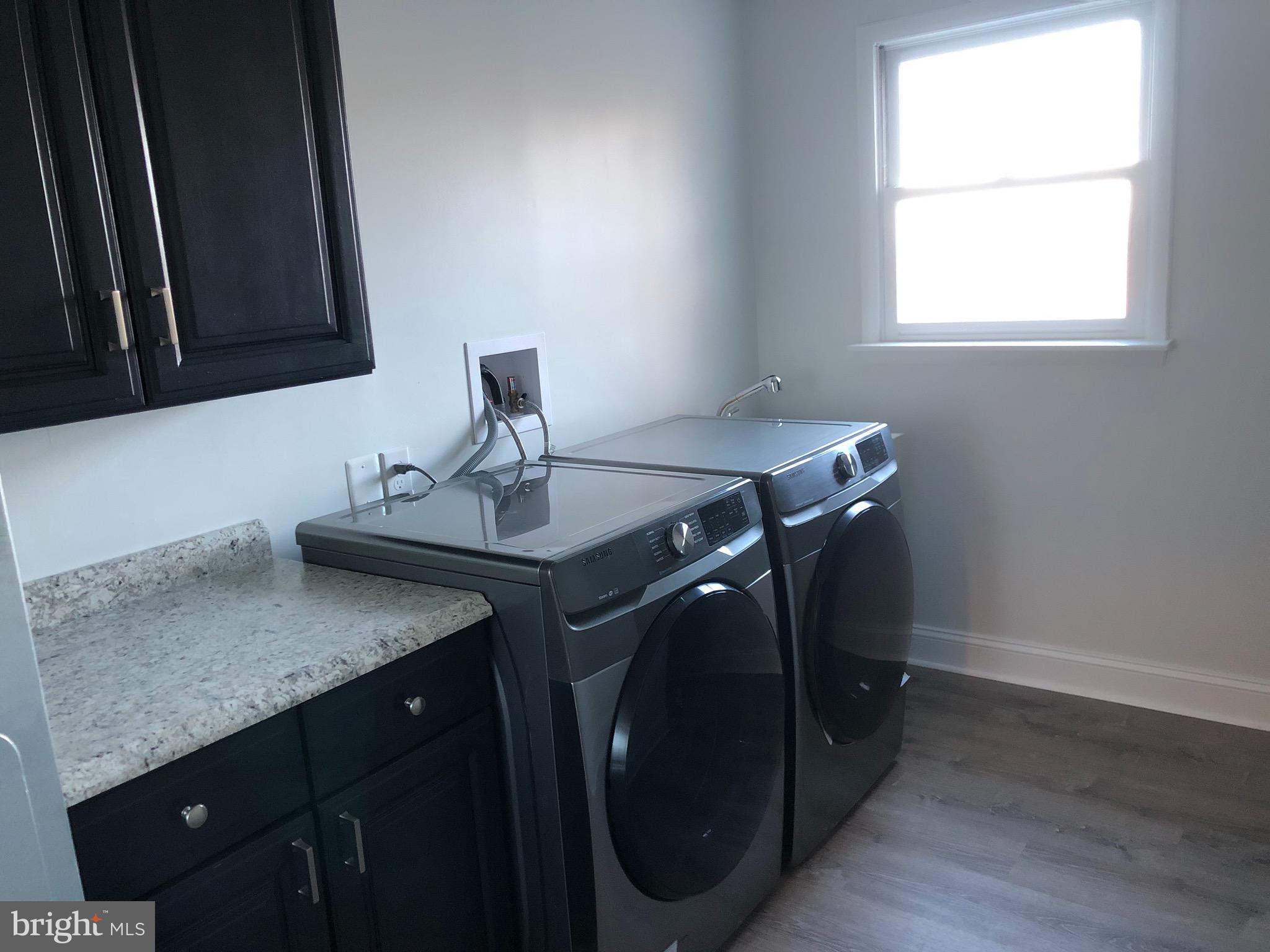 138 Grimes Golden Road Linden, VA 22642 - Photo 64 of 77 a utility room with a sink a washer and dryer