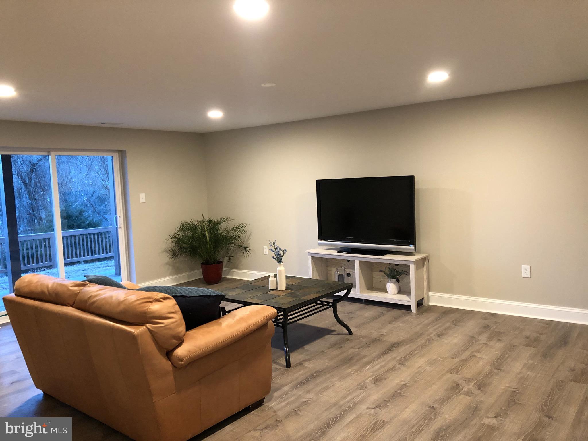 138 Grimes Golden Road Linden, VA 22642 - Photo 69 of 77 a living room with furniture and a flat screen tv
