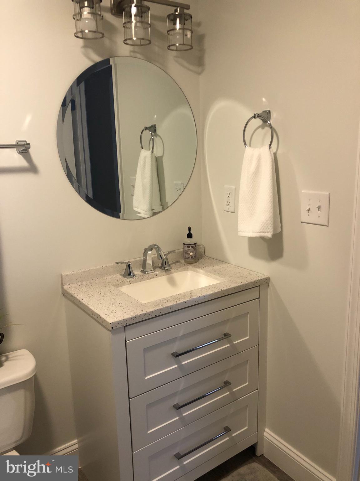 138 Grimes Golden Road Linden, VA 22642 - Photo 76 of 77 a bathroom with a sink and mirror