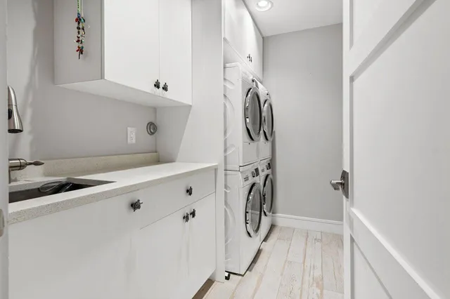 a bedroom with bed and window