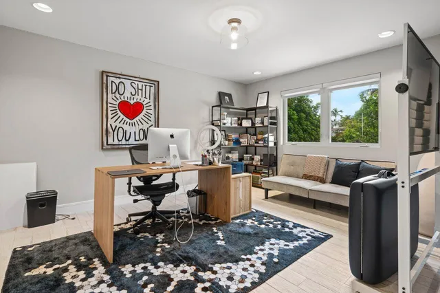 a bathroom with a toilet a sink and shower