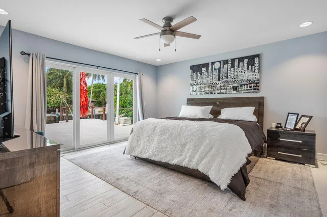 a bathroom with a toilet a sink and a mirror