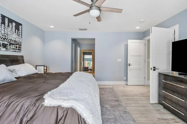a view of a patio with a table chairs and a table