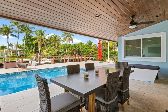 a lobby with a table and chairs