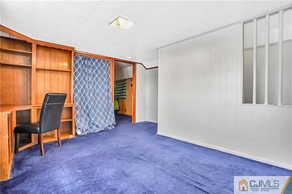 141 Old Road Sewaren, NJ 07077 - Photo 14 of 30 a view of room with furniture and a window