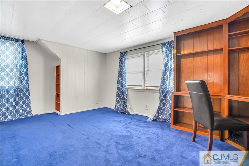 141 Old Road Sewaren, NJ 07077 - Photo 15 of 30 a view of an empty room with a window