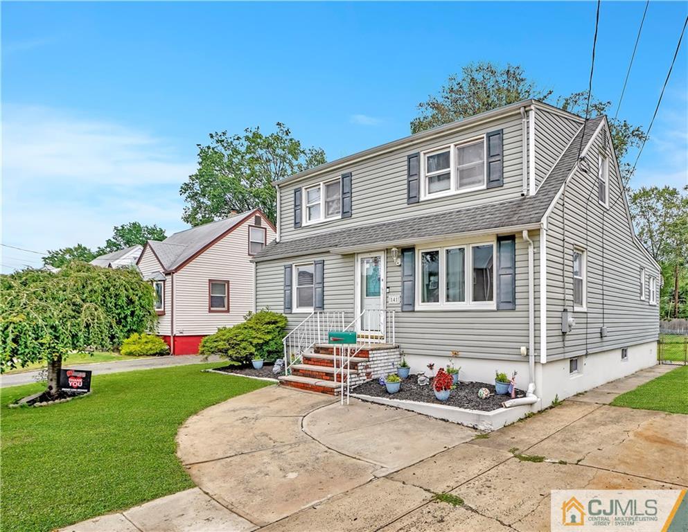 141 Old Road Sewaren, NJ 07077 - Photo 2 of 30 a front view of house with yard
