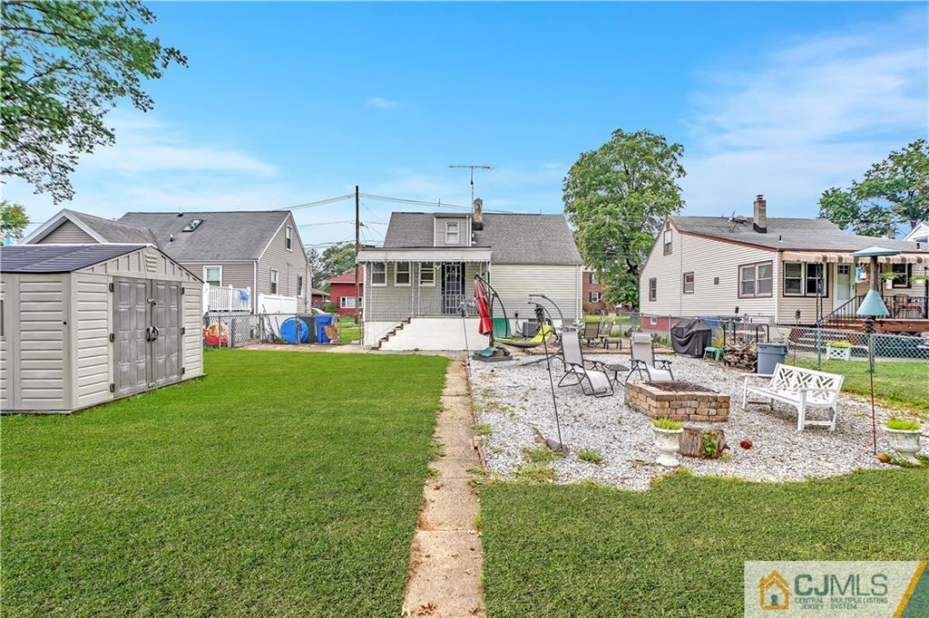 141 Old Road Sewaren, NJ 07077 - Photo 27 of 30 a view of a house with a swimming pool