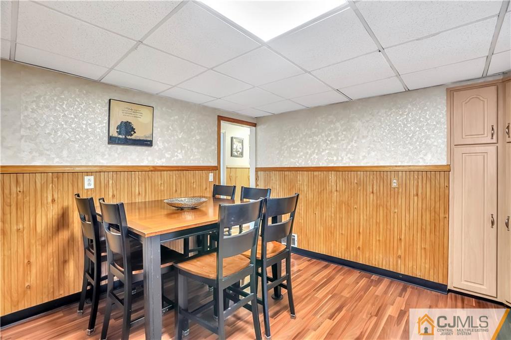 141 Old Road Sewaren, NJ 07077 - Photo 6 of 30 a view of a dining room with furniture and wooden floor