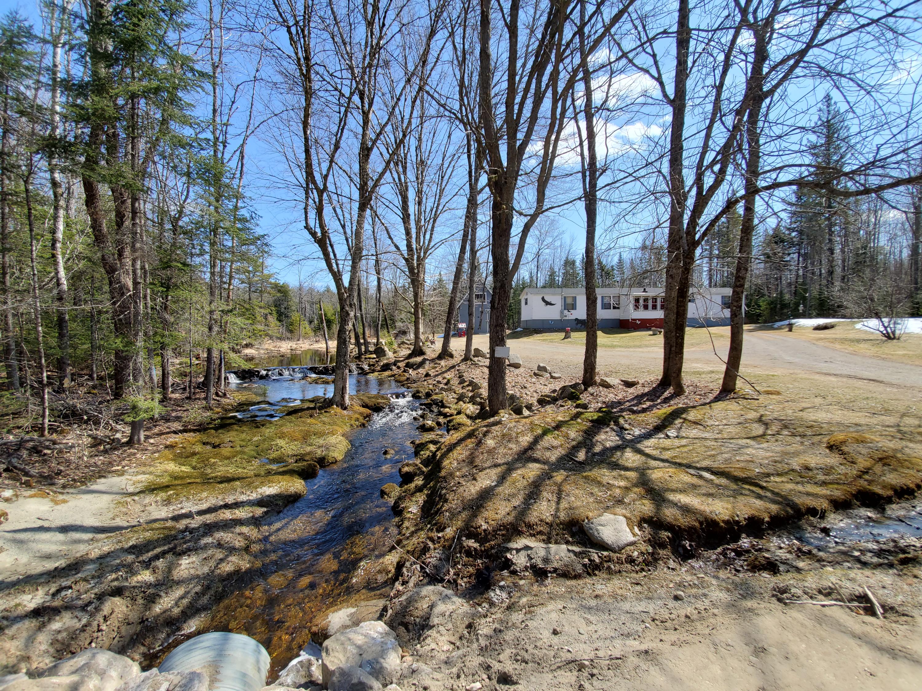 360 Half Township Road Lincoln, ME 04457 - Photo 3 of 36 Comfortable set back from road