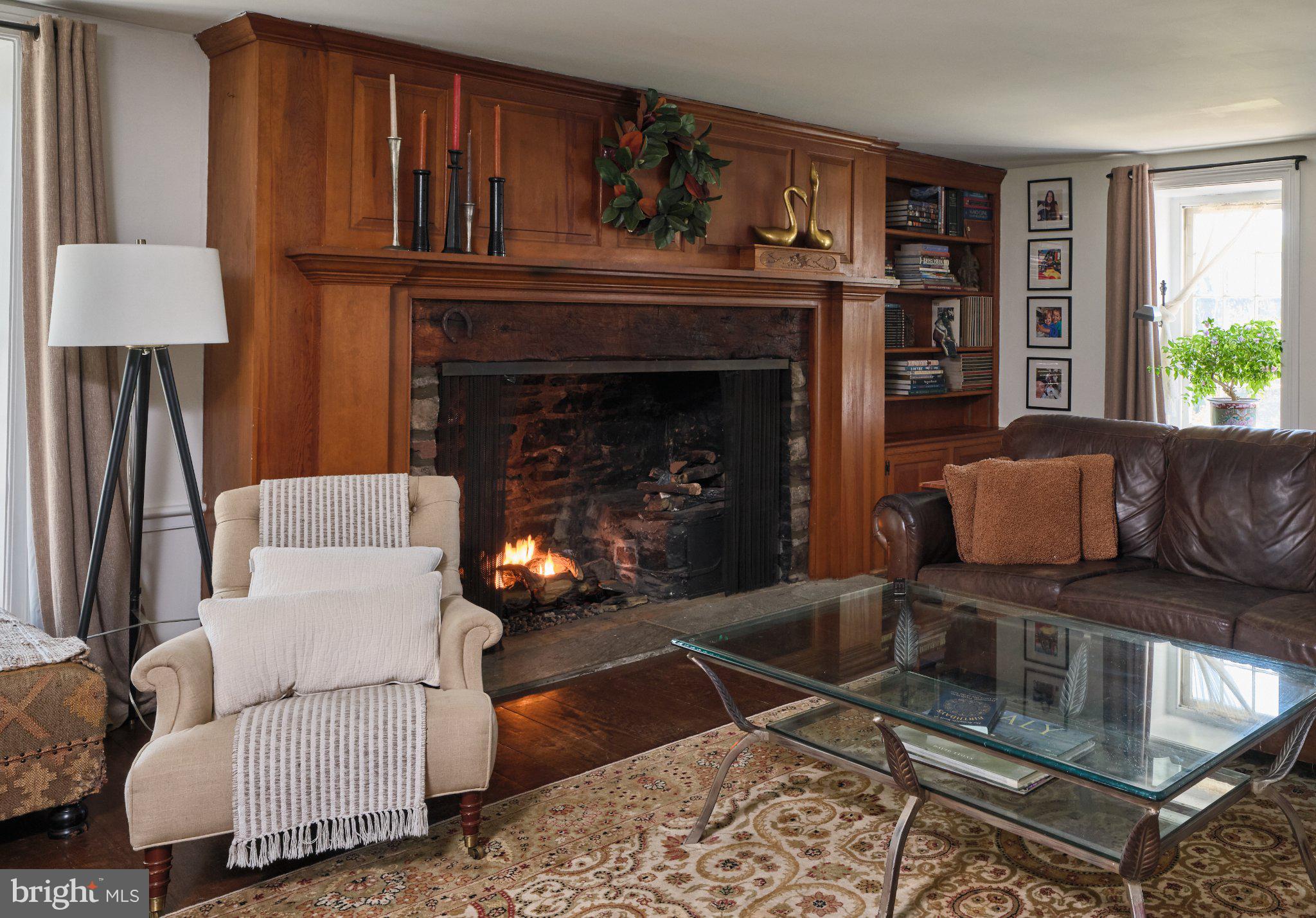 765 Swamp Road Newtown, PA 18940 - Photo 4 of 37 a living room with furniture and a fireplace