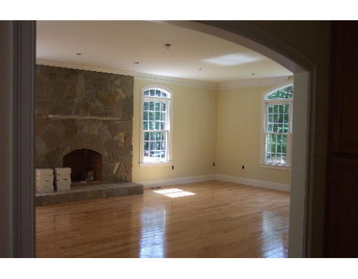 Lot 3 Highland Road Andover, MA 01810 - Photo 5 of 7 a view of a livingroom with a window and fireplace