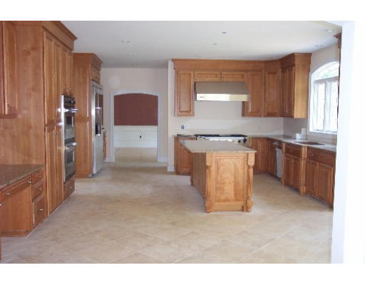 Lot 3 Highland Road Andover, MA 01810 - Photo 6 of 7 a large kitchen with stainless steel appliances granite countertop a stove a sink and a refrigerator