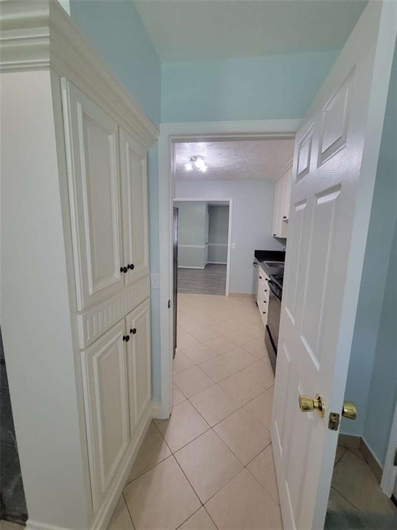 4648 Pine Tree Circle, Unit B Buford, GA 30518 - Photo 10 of 19 a bathroom with a shower and a sink