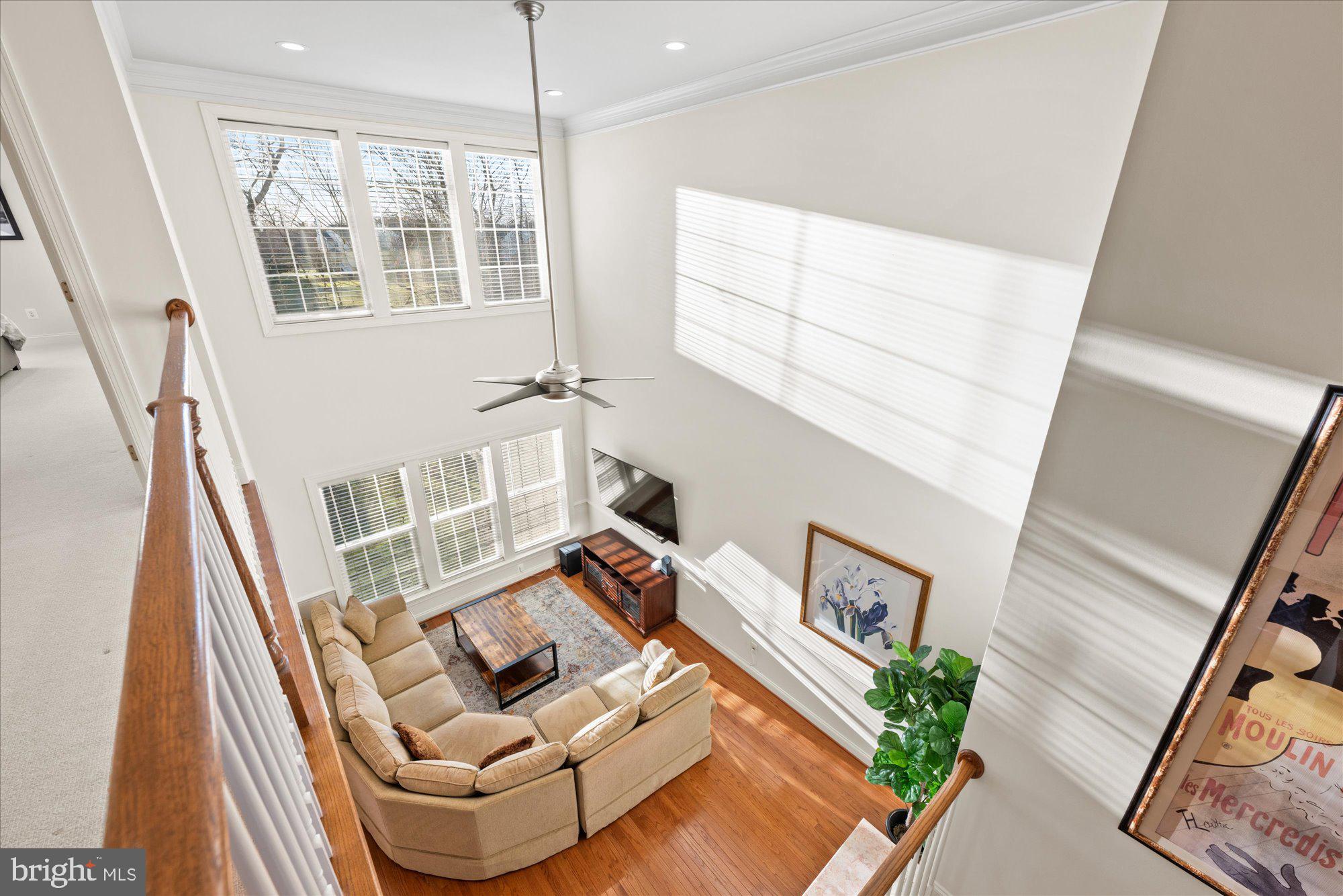 20026 Valhalla Square Ashburn, VA 20147 - Photo 18 of 82 a living room with furniture and a large window
