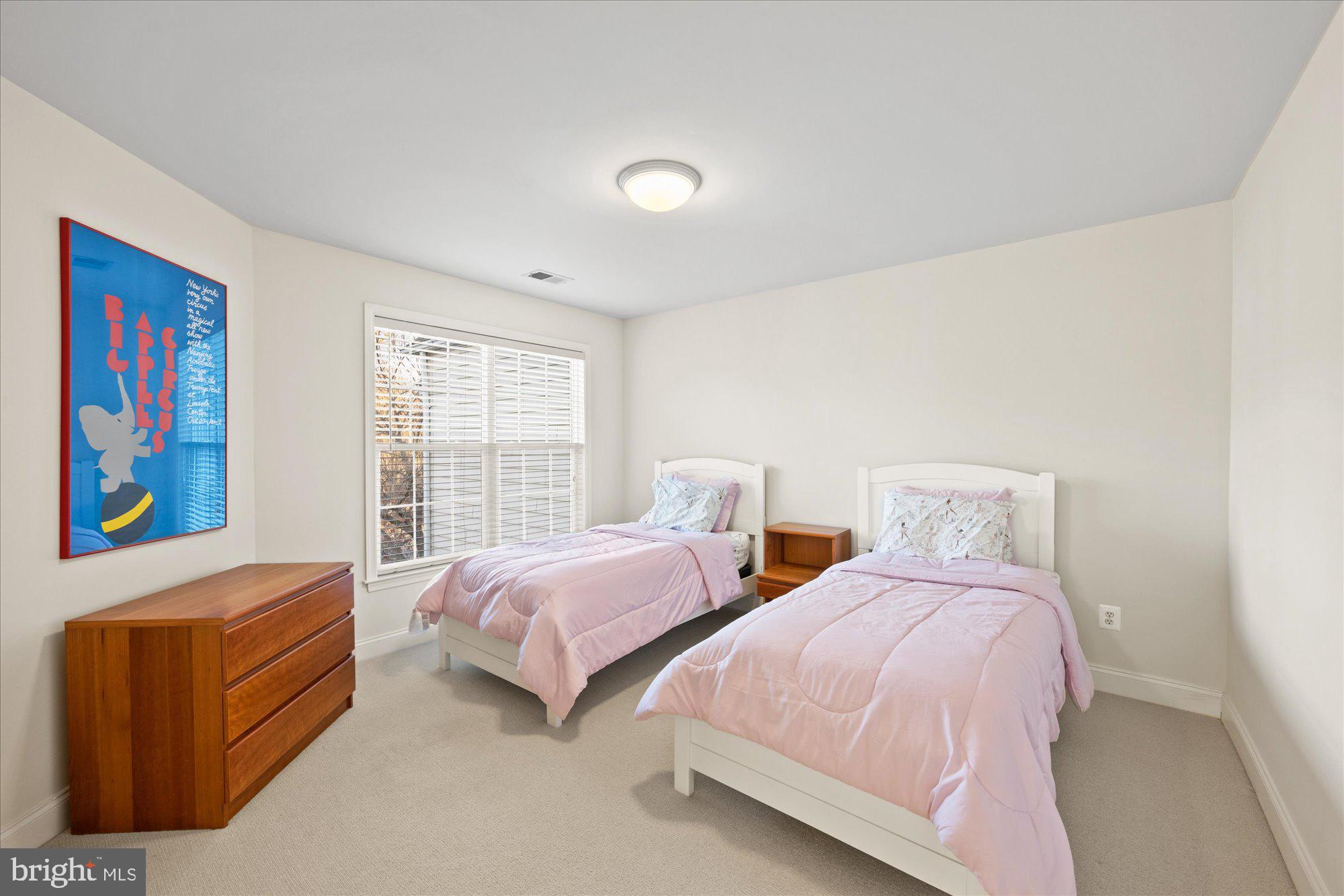 20026 Valhalla Square Ashburn, VA 20147 - Photo 25 of 82 a bedroom with two beds and a window