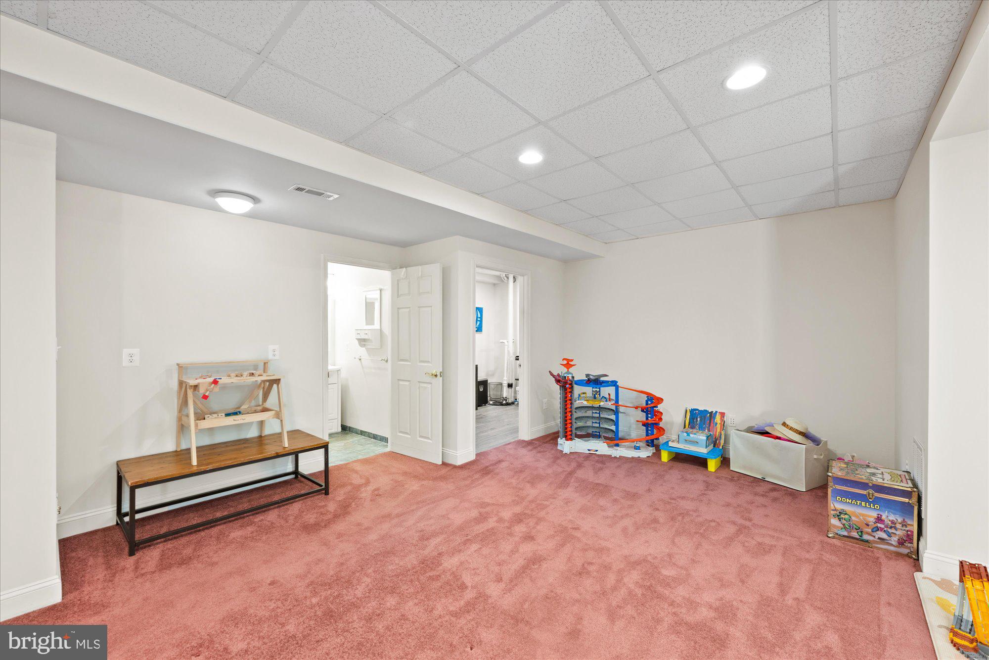 20026 Valhalla Square Ashburn, VA 20147 - Photo 30 of 82 a hallway with toys and wooden floor