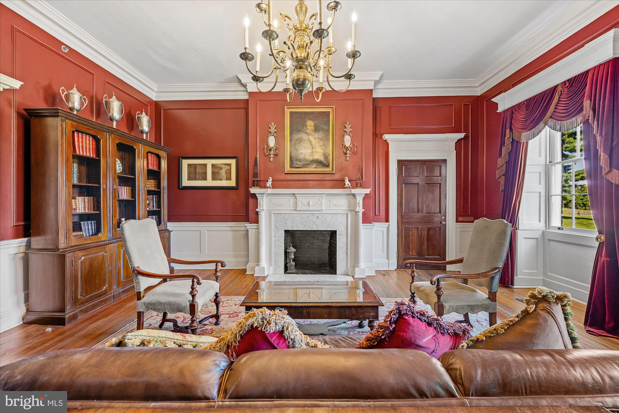 20026 Valhalla Square Ashburn, VA 20147 - Photo 43 of 82 a living room with furniture and a fireplace