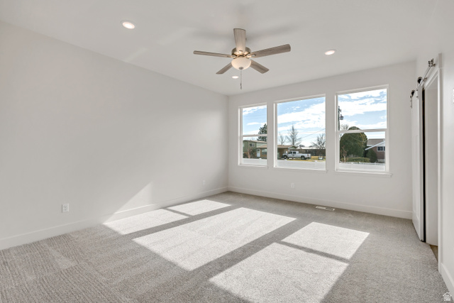 3839 West 825 North, Unit WF18 West Point, UT 84015 - Photo 12 of 22 Spare room featuring light carpet, ceiling fan, and recessed lighting