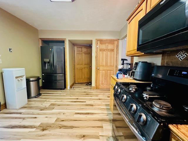 2916 Ninevah Road Knox, PA 16232 - Photo 17 of 42 a kitchen with stainless steel appliances granite countertop a stove and a refrigerator