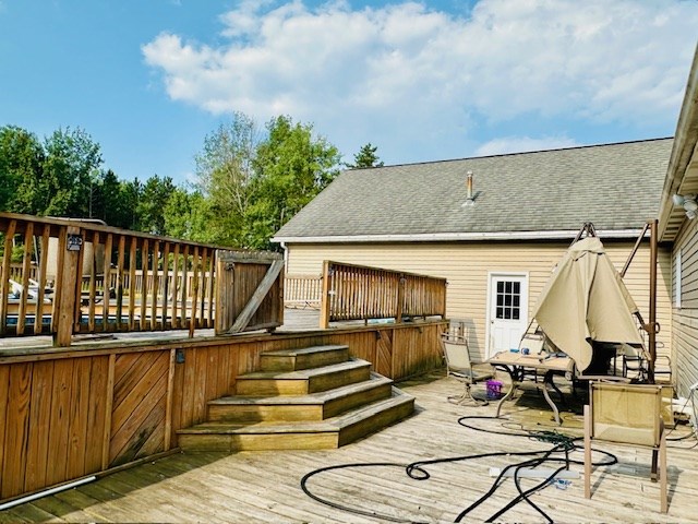 2916 Ninevah Road Knox, PA 16232 - Photo 9 of 42 a view of a deck with chairs a barbeque with wooden floor and fence