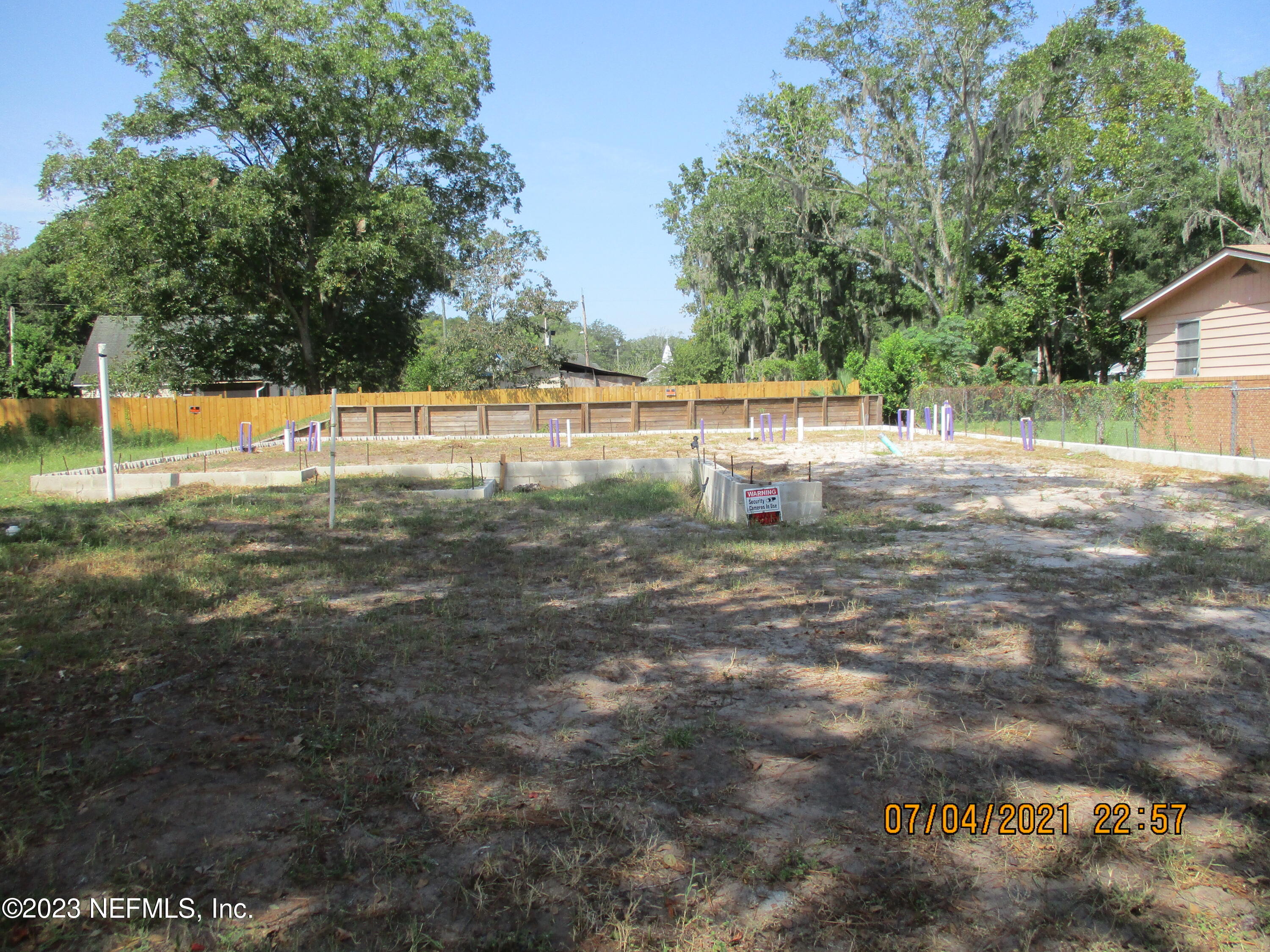 8922 Sibbald Road Jacksonville, FL 32208 - Photo 5 of 5 a view of a yard with a tree
