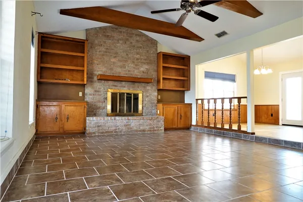 a view of an entryway with a fireplace