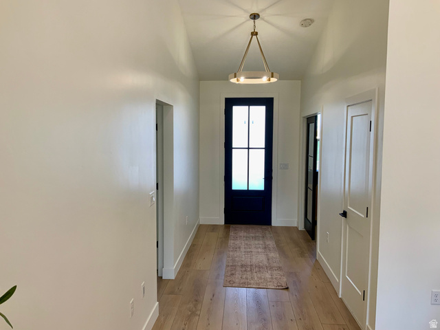 277 West 800 South Monroe, UT 84754 - Photo 9 of 46 Foyer entrance featuring light wood-type flooring and vaulted ceiling