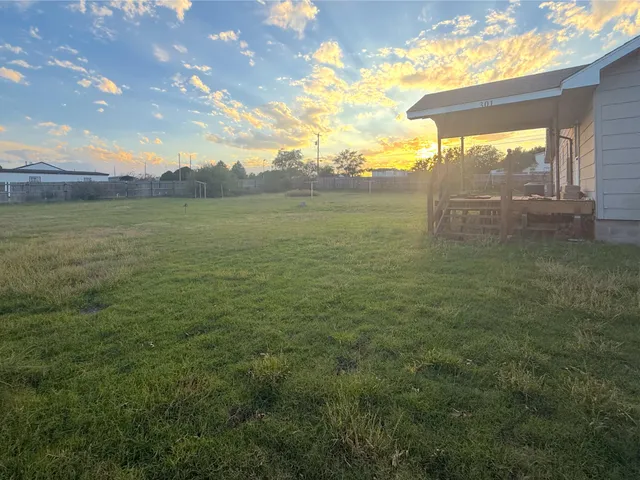 a view of an ocean from a yard
