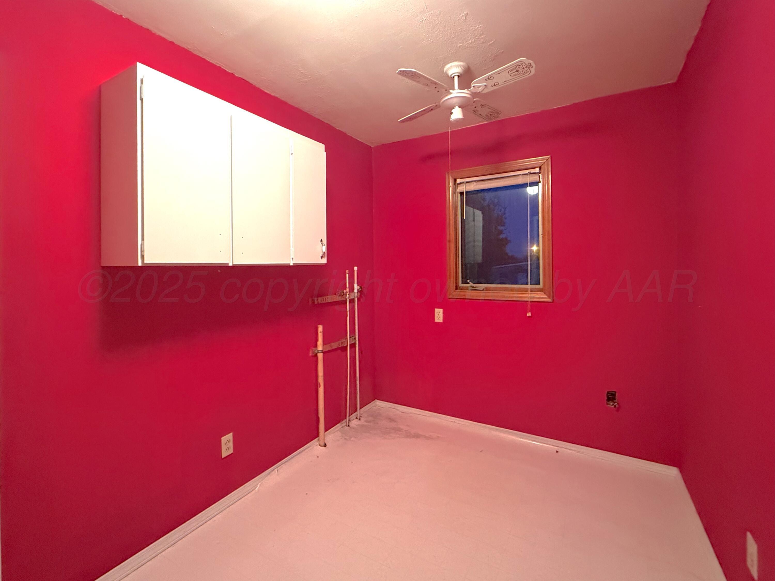 301 West 10th Street Stinnett, TX 79083 - Photo 7 of 15 a view of a big room with a large window