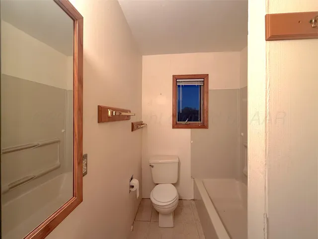 a bathroom with a toilet