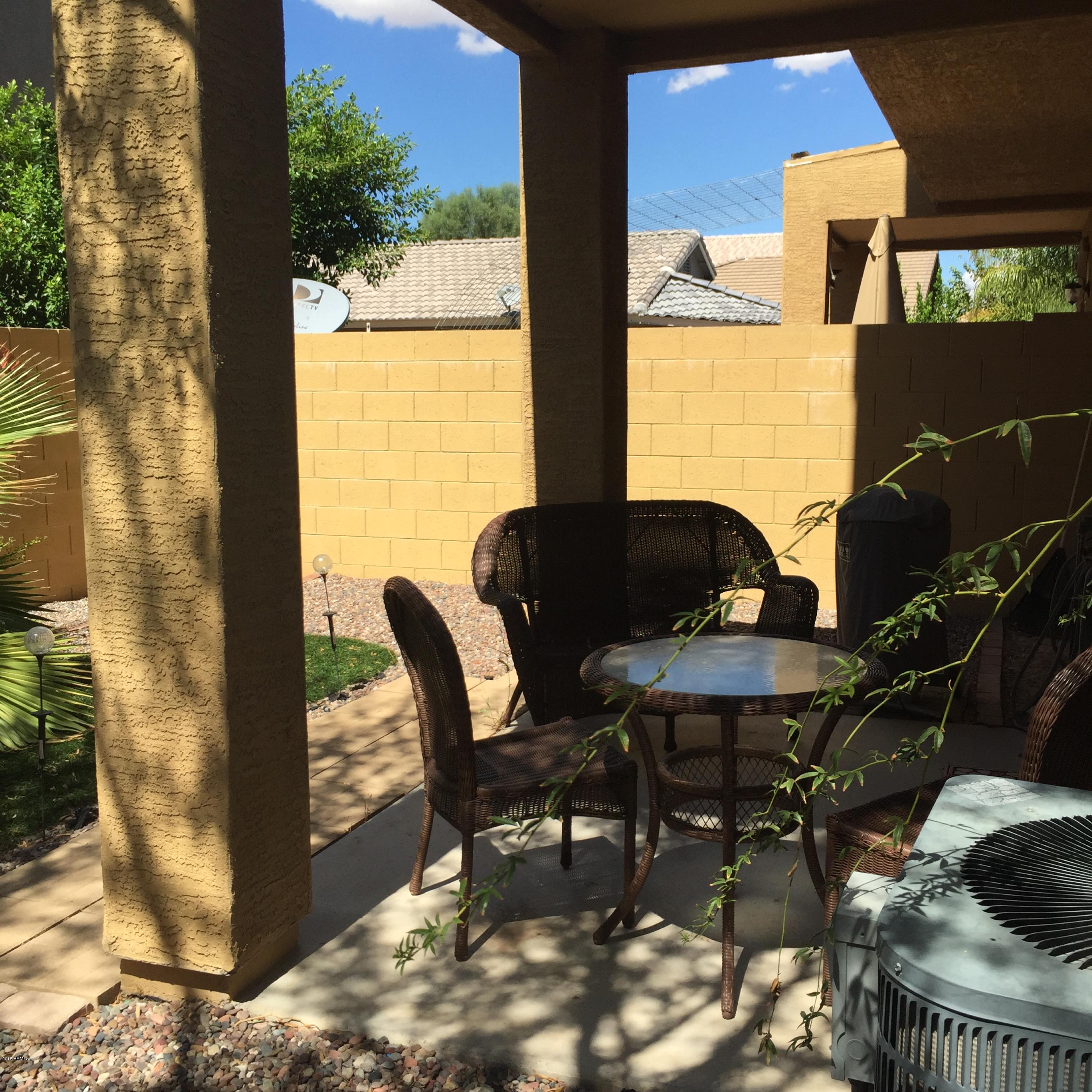2150 East Bell Road, Unit 1094 Phoenix, AZ 85022 - Photo 14 of 17 Backyard Covered Patio