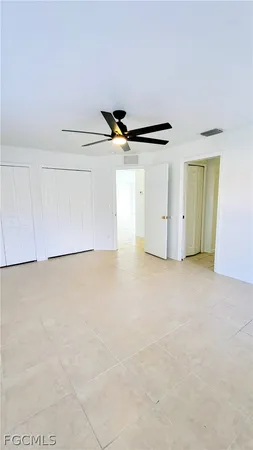 a view of a livingroom with a ceiling fan