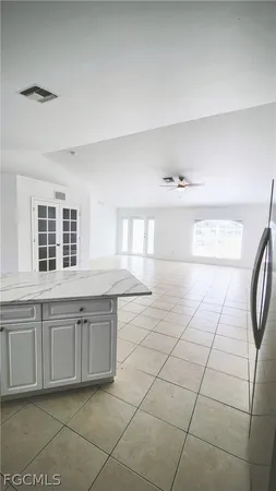 a view of a kitchen with windows